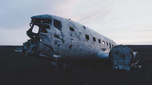 plane wreck abandoned airplane on the floor under white clouds iceland